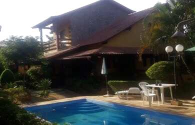 Imagem: A casa possui 5 Dormitórios, 4 Banheiros, 5 Vagas na garagem