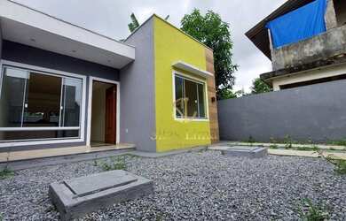 Imagem: A casa possui 2 Dormitórios, 2 Banheiros, 3 Vagas na garagem