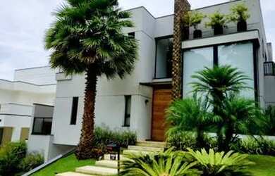 Imagem: A casa em condomínio possui 4 Dormitórios, 5 Banheiros, 5