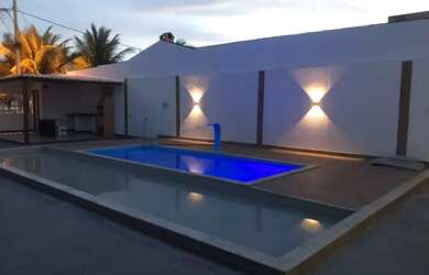 Imagem: A casa possui 3 Dormitórios, 5 Vagas na garagem e está localizado