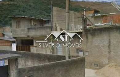 Imagem: A casa possui 3 Dormitórios, 2 Banheiros, 1 Vaga na garagem