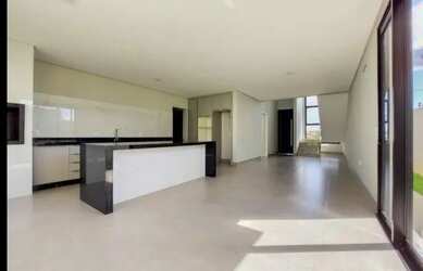 Imagem: A casa possui 3 Dormitórios, 5 Banheiros, 4 Vagas na garagem