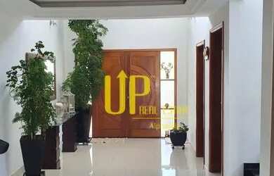 Imagem: A casa em condomínio possui 4 Dormitórios, 5 Banheiros e 460m²