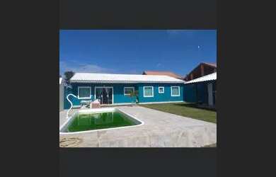 Imagem: A casa possui 2 Dormitórios, 5 Vagas na garagem e está localizado