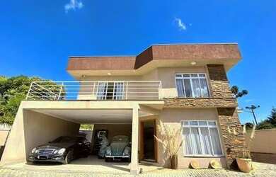 Imagem: A casa em condomínio possui 4 Dormitórios, 3 Banheiros, 5