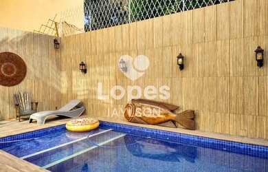 Imagem: A casa possui 2 Dormitórios, 2 Banheiros, 3 Vagas na garagem