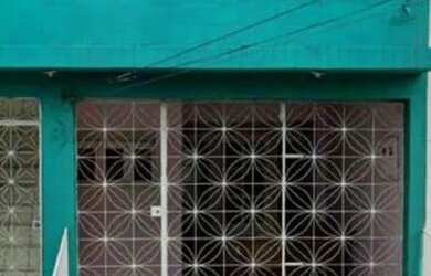 Imagem: A casa possui 3 Dormitórios, 2 Banheiros e 2 Vagas na garagem