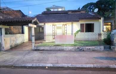 Imagem: A casa possui 2 Dormitórios, 1 Banheiro, 1 Vaga na garagem