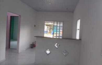 Imagem: A casa possui 2 Dormitórios, 2 Banheiros, 1 Vaga na garagem