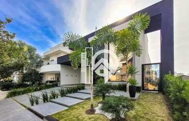 Imagem: A casa em condomínio possui 3 Dormitórios, 5 Banheiros, 4