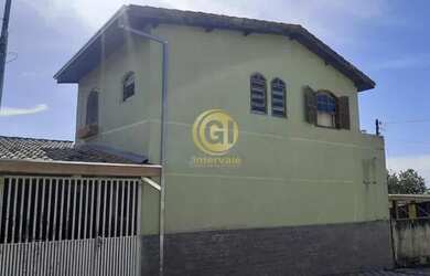 Imagem: A casa possui 3 Dormitórios, 2 Banheiros, 1 Vaga na garagem