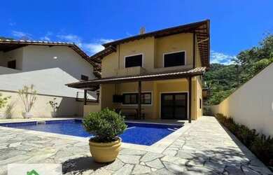 Imagem: A casa em condomínio possui 5 Dormitórios, 5 Banheiros, 4