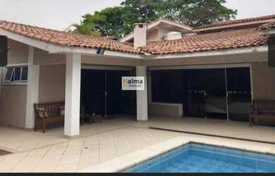 Imagem: A casa em condomínio possui 5 Dormitórios, 5 Banheiros, 4