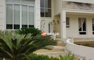 Imagem: A casa em condomínio possui 4 Dormitórios, 5 Banheiros, 5