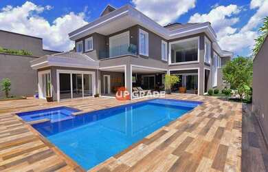 Imagem: A casa em condomínio possui 5 Dormitórios, 5 Banheiros, 4