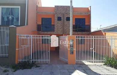 Imagem: A casa possui 3 Dormitórios, 2 Banheiros, 2 Vagas na garagem