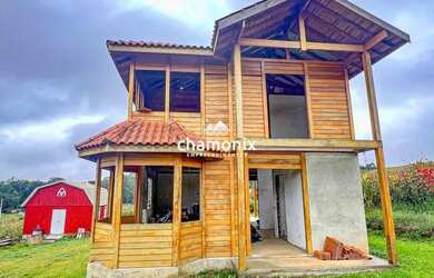 Imagem: A casa possui 3 Dormitórios, 3 Banheiros, 3 Vagas na garagem