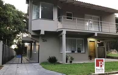 Imagem: A casa em condomínio possui 4 Dormitórios, 3 Banheiros, 2