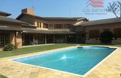 Imagem: A casa em condomínio possui 5 Dormitórios, 5 Banheiros, 2