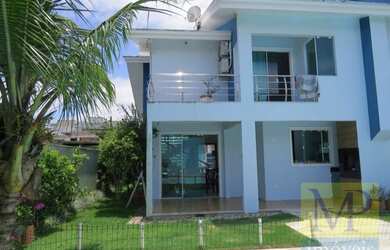 Imagem: A casa possui 3 Dormitórios, 2 Banheiros, 1 Vaga na garagem