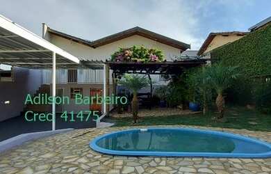 Imagem: A casa possui 3 Dormitórios, 1 Banheiro, 4 Vagas na garagem