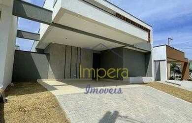 Imagem: A casa possui 3 Dormitórios, 2 Banheiros, 2 Vagas na garagem