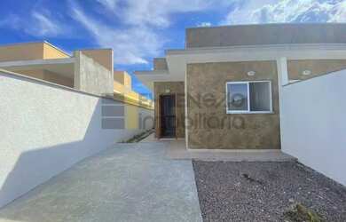 Imagem: A casa possui 2 Dormitórios, 2 Banheiros, 2 Vagas na garagem