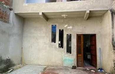 Imagem: A casa possui 2 Dormitórios, 1 Banheiro, 2 Vagas na garagem