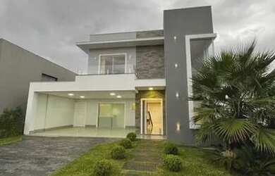 Imagem: A casa possui 3 Dormitórios, 3 Banheiros, 2 Vagas na garagem