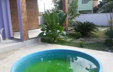 Imagem: A casa possui 3 Dormitórios, 3 Banheiros, 4 Vagas na garagem