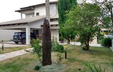 Imagem: A casa possui 4 Dormitórios, 5 Banheiros e 1000m² de Área