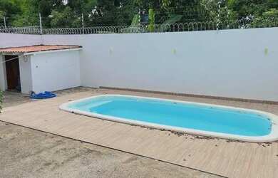 Imagem: A casa possui 2 Dormitórios, 2 Banheiros, 1 Vaga na garagem