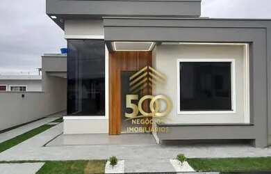 Imagem: A casa possui 3 Dormitórios, 2 Banheiros, 1 Vaga na garagem