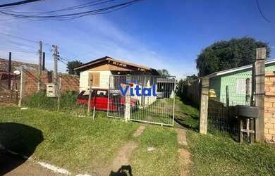 Imagem: A casa possui 3 Dormitórios, 3 Banheiros, 484m² de Área e