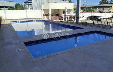 Imagem: O apartamento possui 2 Dormitórios, 1 Banheiro, 1 Vaga na garagem