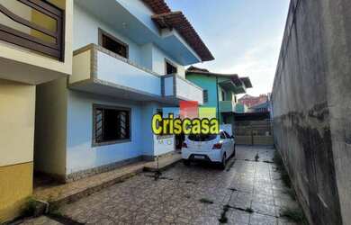 Imagem: A casa possui 4 Dormitórios, 2 Banheiros, 2 Vagas na garagem