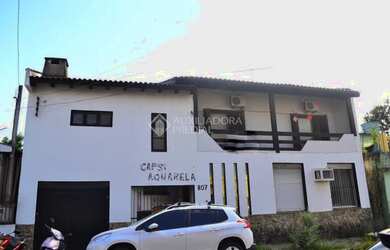 Imagem: A casa possui 1 Dormitório, 2 Banheiros, 2 Vagas na garagem