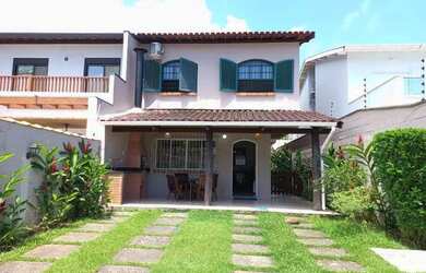 Imagem: A casa possui 5 Dormitórios, 4 Banheiros, 4 Vagas na garagem