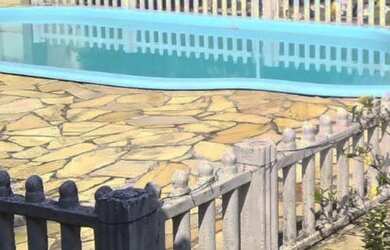 Imagem: A casa possui 4 Dormitórios, 2 Banheiros, 4 Vagas na garagem