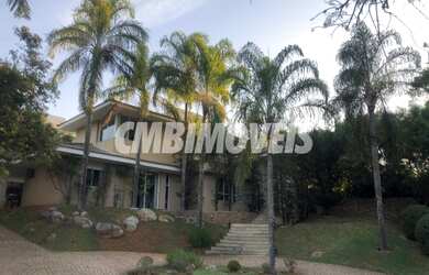 Imagem: A casa possui 5 Dormitórios, 5 Banheiros, 4 Vagas na garagem