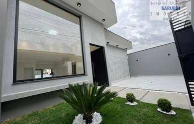 Imagem: A casa possui 3 Dormitórios, 3 Banheiros, 4 Vagas na garagem