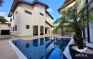 Imagem: A casa em condomínio possui 4 Dormitórios, 5 Banheiros, 4