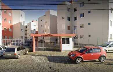 Imagem: O apartamento possui 2 Dormitórios, 1 Banheiro, 2 Vagas na