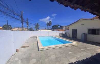 Imagem: A casa possui 5 Dormitórios, 4 Banheiros, 5 Vagas na garagem