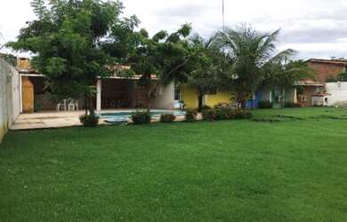 Imagem: A casa possui 4 Dormitórios, 5 Banheiros, 5 Vagas na garagem