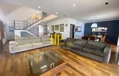 Imagem: A casa em condomínio possui 4 Dormitórios, 5 Banheiros, 5