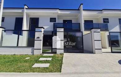 Imagem: A casa possui 3 Dormitórios, 3 Banheiros, 2 Vagas na garagem