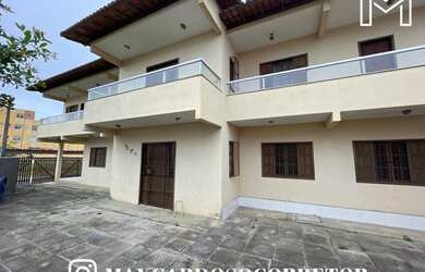 Imagem: A casa possui 4 Dormitórios, 3 Banheiros, 2 Vagas na garagem