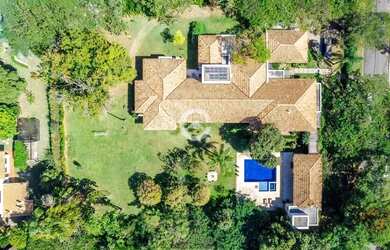 Imagem: A casa em condomínio possui 5 Dormitórios, 5 Banheiros, 5