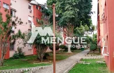 Imagem: O apartamento possui 3 Dormitórios, 1 Banheiro, 1 Vaga na garagem